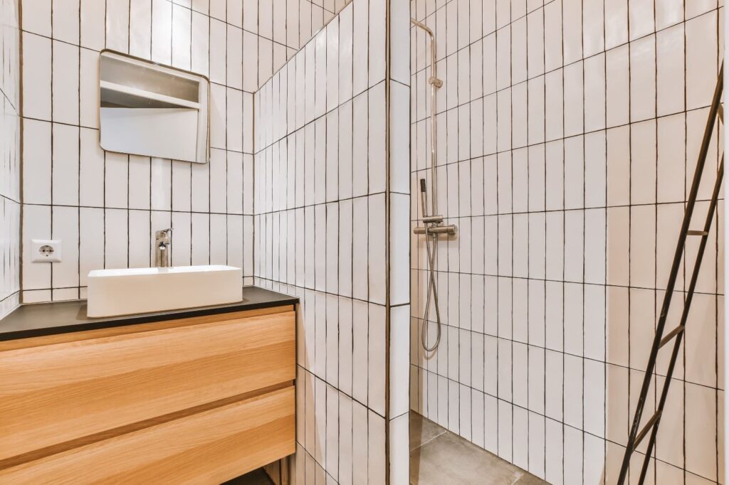 Vertical stack pattern tiles for maximizing smaller bathrooms