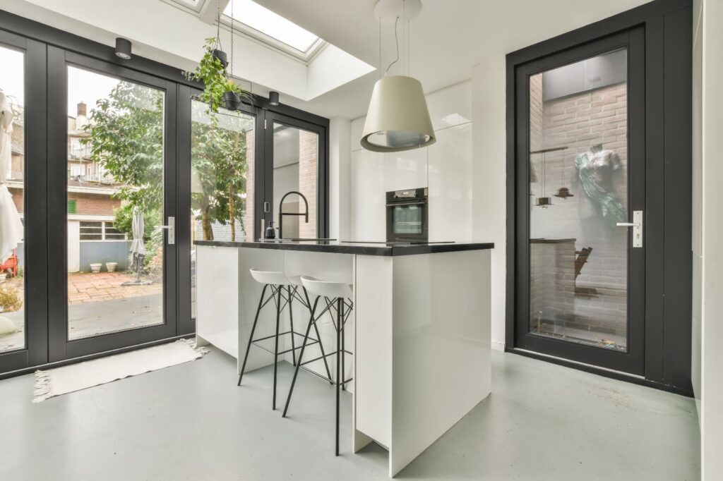 Wide-Opening Patio Door system behind open kitchens